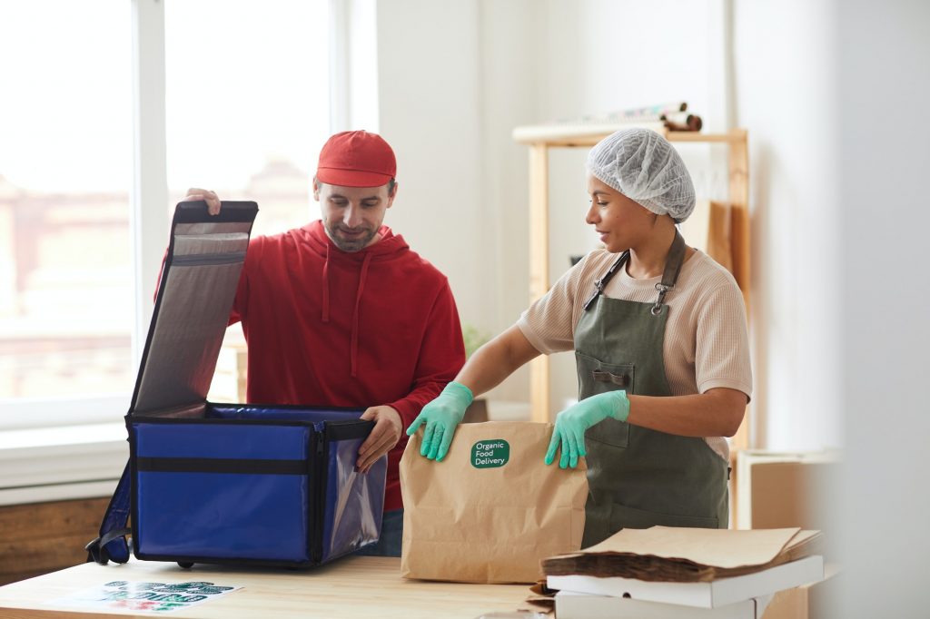 Customers using eco-friendly laundry services in Frederick MD with energy-efficient washing machines