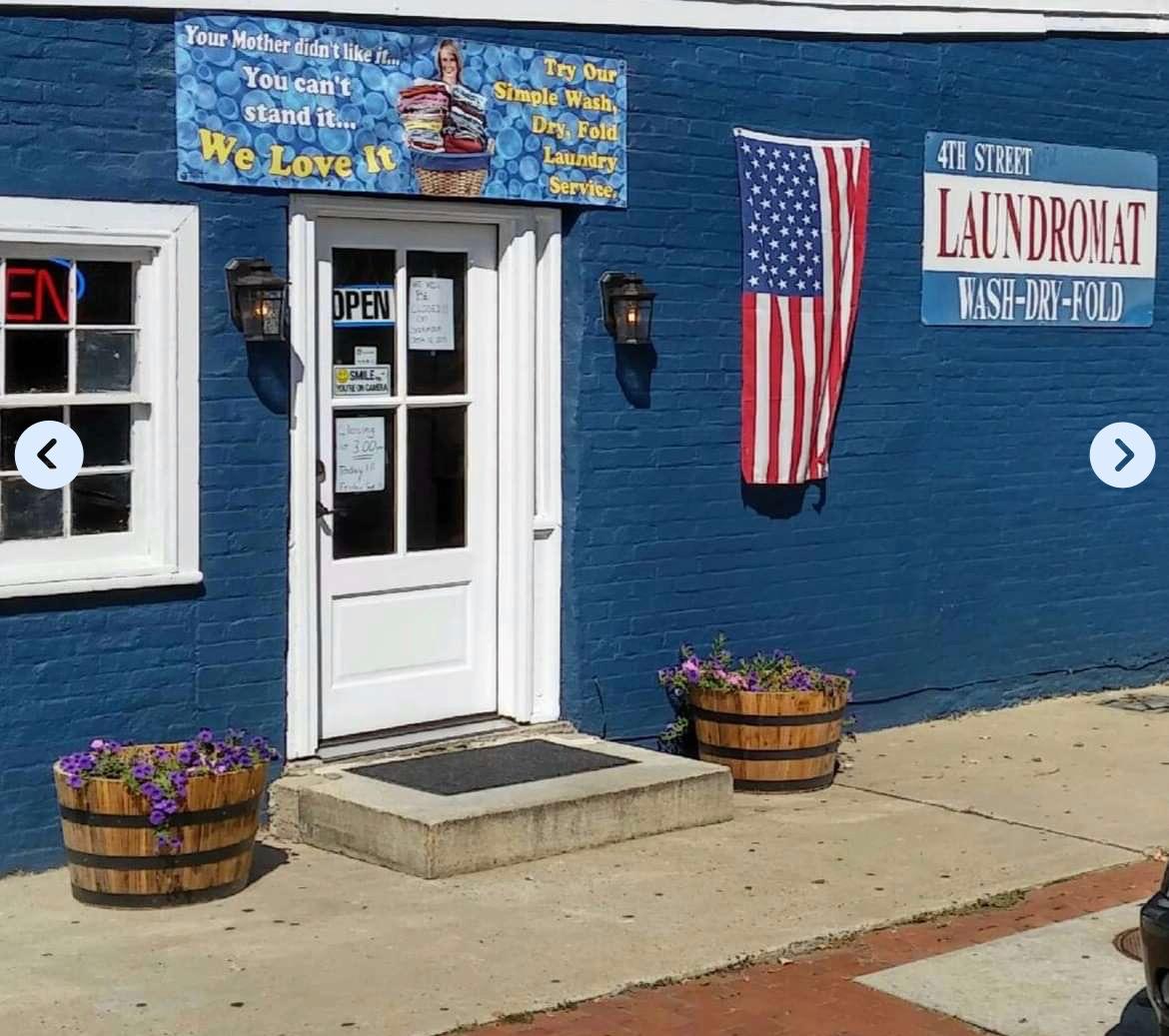 Blue storefront building representing a local Wash & Fold laundry service near Urbana