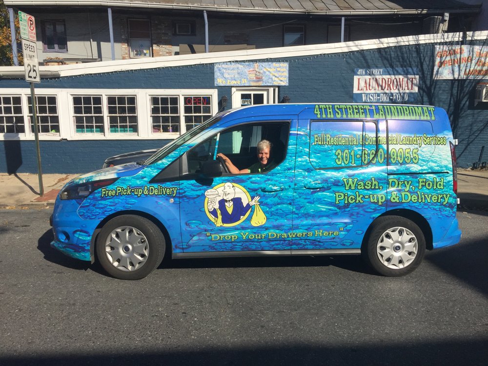 Laundry pickup and delivery service vehicle serving residential and commercial customers in Frederick MD