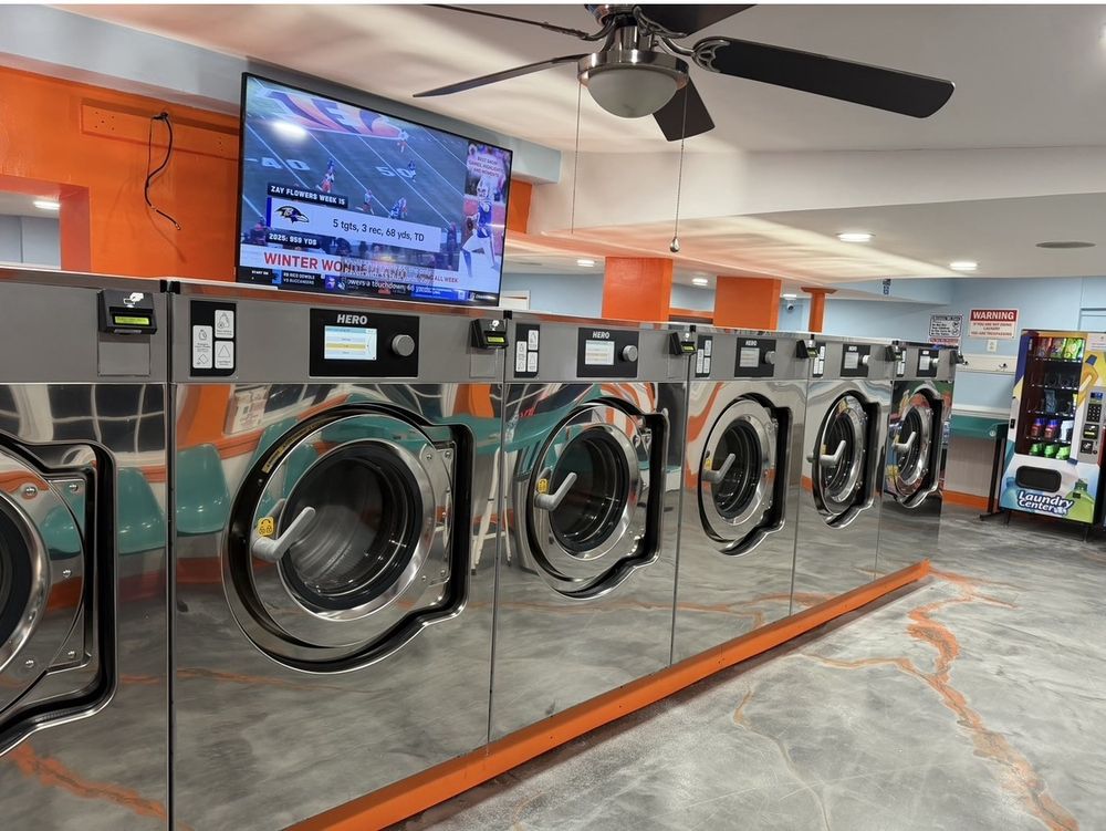 Commercial laundry facility with modern washing machines supporting specialty laundry services for local businesses in Frederick MD